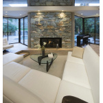 Witte ronde Kanlux COLLIE inbouwspots verlichten moderne woonkamer met stenen haard