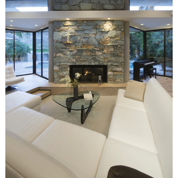 Witte ronde Kanlux COLLIE inbouwspots verlichten moderne woonkamer met stenen haard