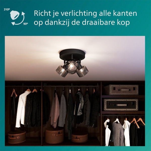 Ronde plafondspot met drie zwarte draaibare armen en gerookt glas in kast