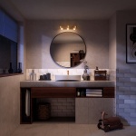 Gouden plafondspot met drie lichtpunten boven badkamer spiegel