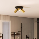 Gouden plafondspot met drie verstelbare lampen in moderne badkamer