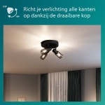 Zwarte ronde plafondspot met drie draaibare lampen en gerookt glas