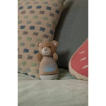 Sfeerbeeld van Kinder Nachtlampje Beer met Muziekfunctie DOLLY - Lucide op de bank