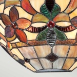 Glas-in-lood lampenkap met bloemmotief in amber, rood en groen glas
